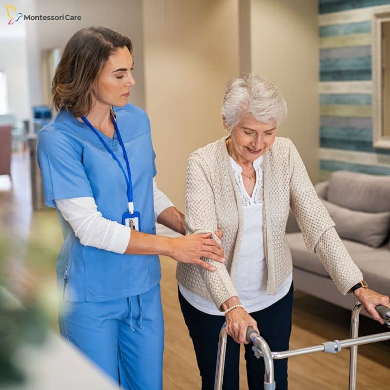 NDIS Provider in West Gosford supporting elderly woman with walker during assisted care in a residential setting.