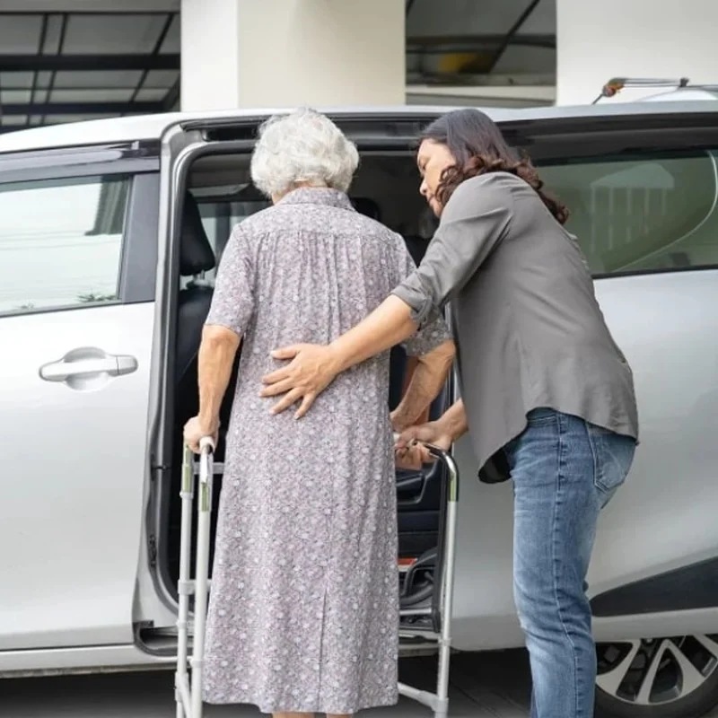 How does assistance with travel improve independence? — illustration from Montessori Care